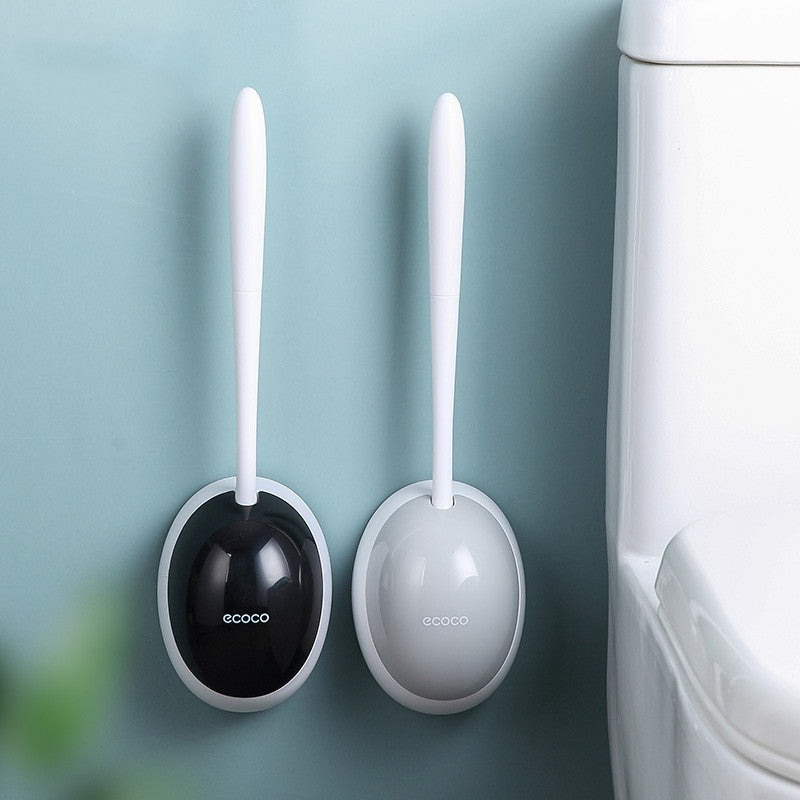 Minimalist toilet brush set with secure wall mounting and easy-clean storage container