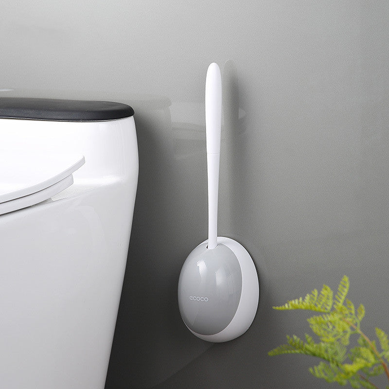 Wall-mounted toilet brush holder with hidden installation and hygienic storage design