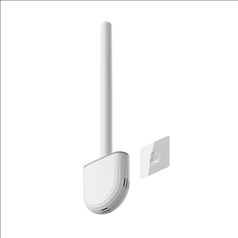 Efficient toilet cleaning brush with soft silicone bristles and compact wall-mounted holder
