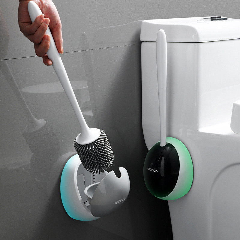 Durable wall-mounted toilet cleaning brush showing covered holder and drainage design