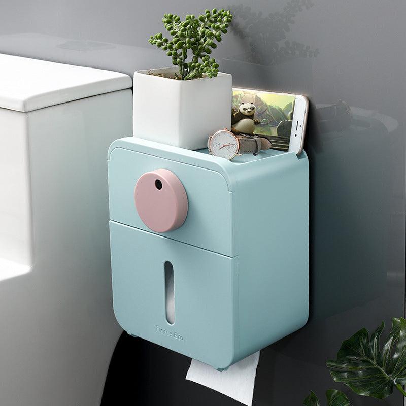 Space-saving toilet paper holder featuring enclosed box design and moisture protection