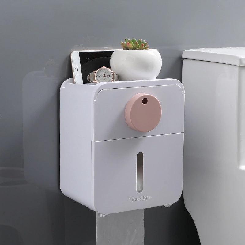 Enclosed wall-mounted toilet tissue holder featuring moisture-resistant design and easy refills