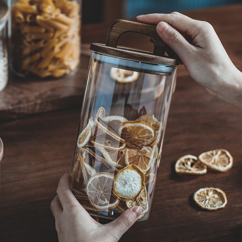 Modern Japanese kitchen storage displaying transparent design with wooden cover for cereal preservation