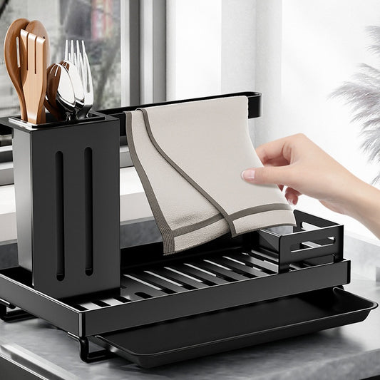 Wall-mounted kitchen storage rack featuring adhesive installation with integrated cloth drying functionality