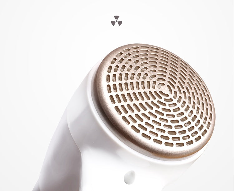 Space-saving toilet hair dryer mount showing secure wall bracket installation