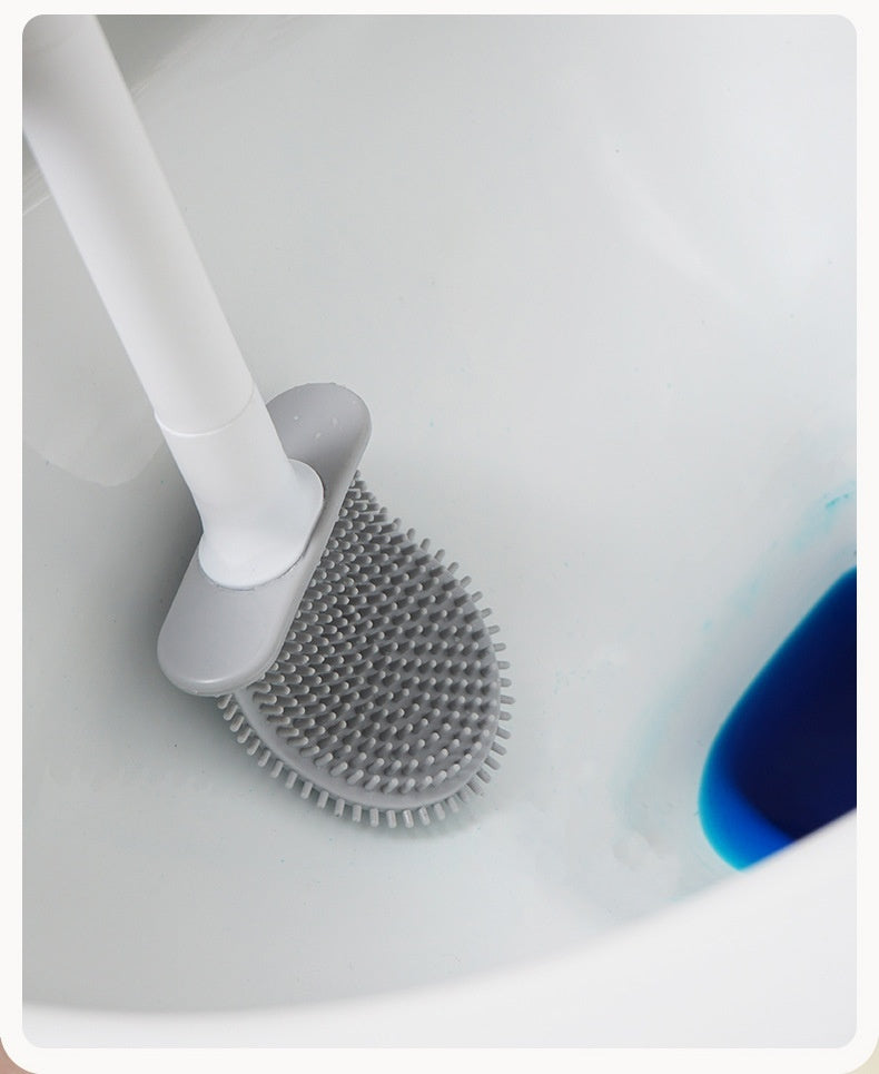 Durable wall-mounted bathroom brush with long-lasting silicone head and drip-dry storage