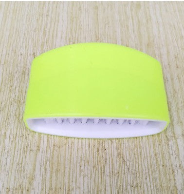 Professional-grade kitchen scrubber with fun alligator design featuring targeted cleaning capabilities